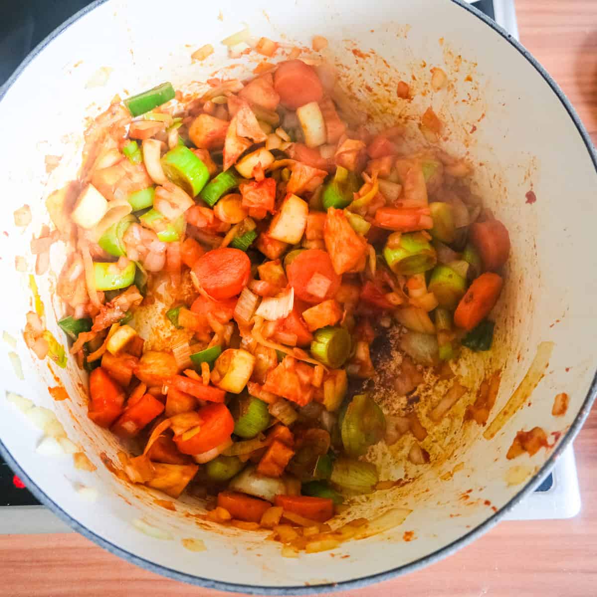 frying the vegetables for the sauce base