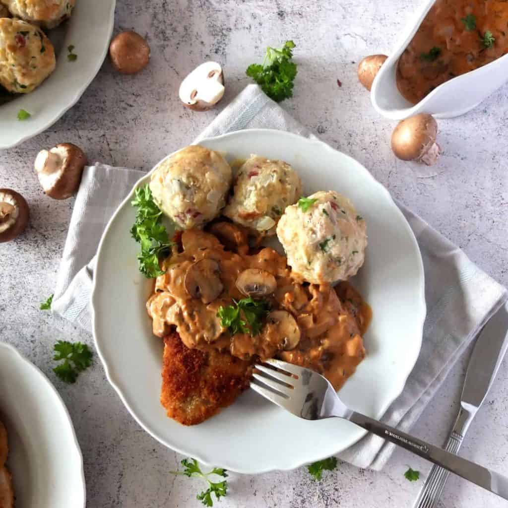 Schnitzel with bread dumplings and jager sace