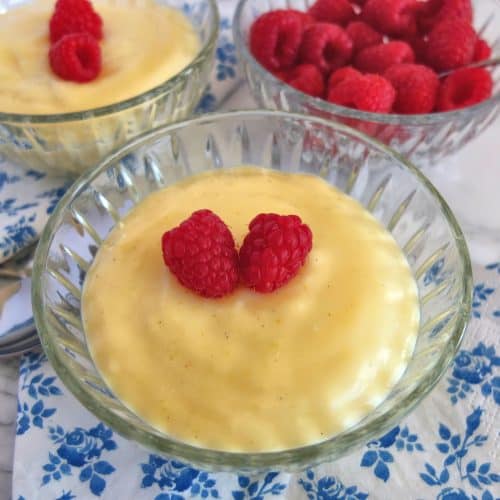 German vanilla pudding with fresh raspberries