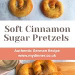 Above 5 sugar pretzels on a white background. Above a bowl with cinnamon sugar and at the right a glas of milk. At the bottom you can see three cinnamon sugar pretzels on a chopping board