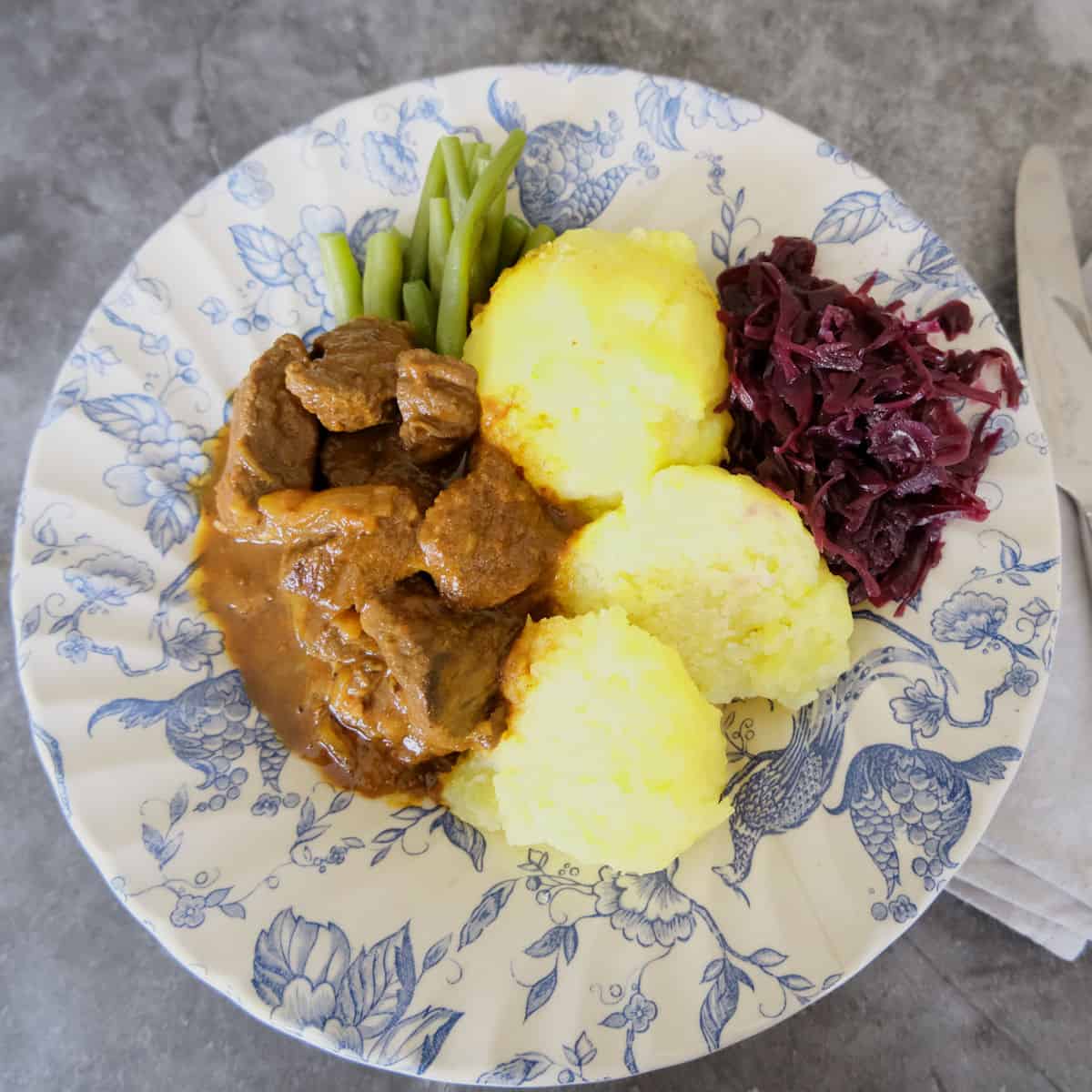 German Goulash with Dumplings and Red Cabbage