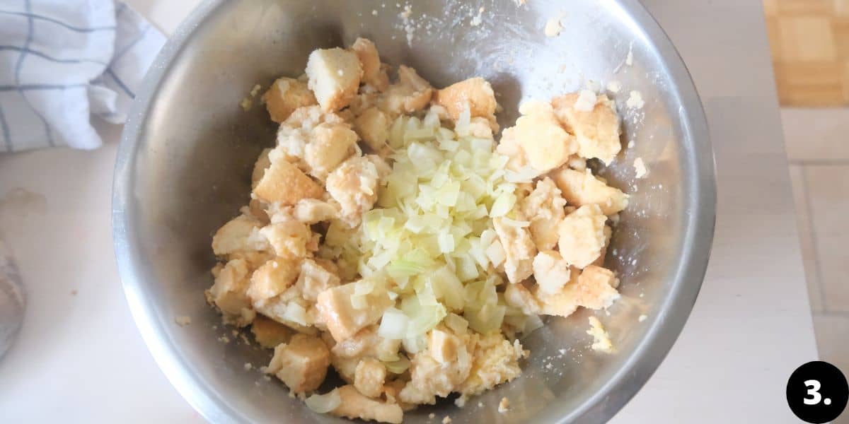 mixing the breadcrumbs with onions.