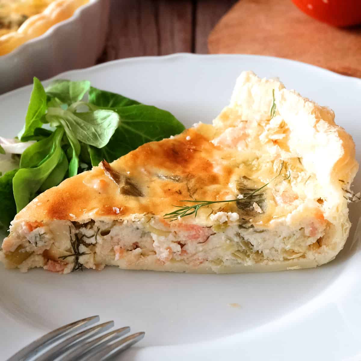 slice of smoked salmon quiche.