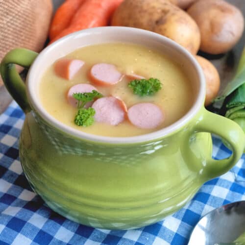 German Potato Soup in a Bowl with Vegetables