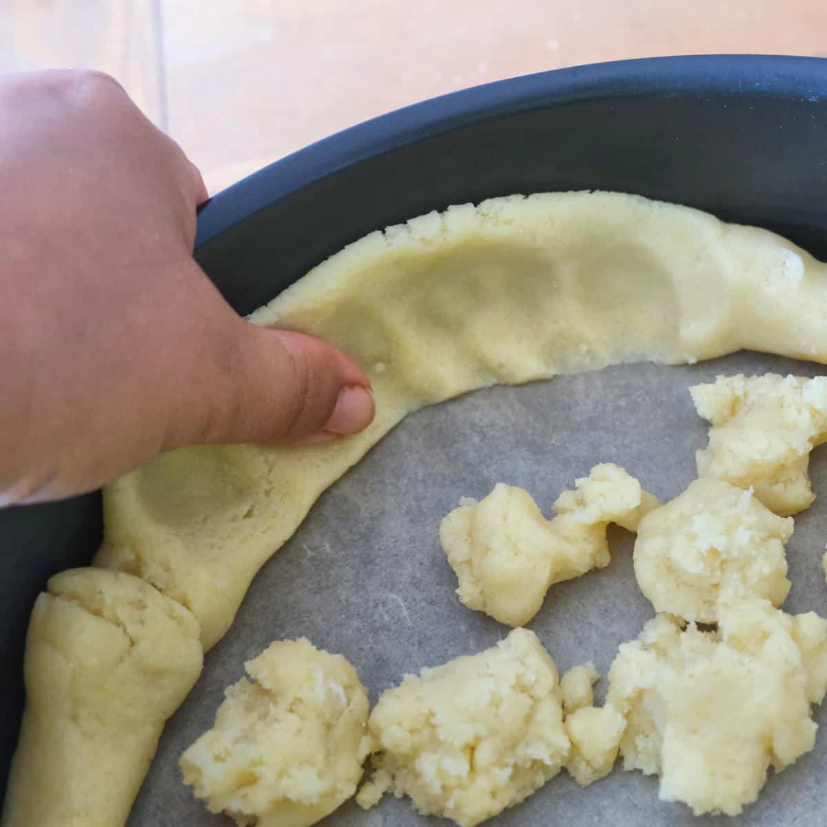 Adding though to the rim of the pie cake
