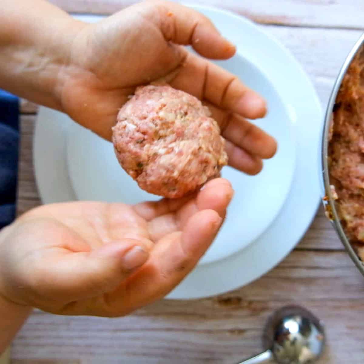 shaping the meatballs