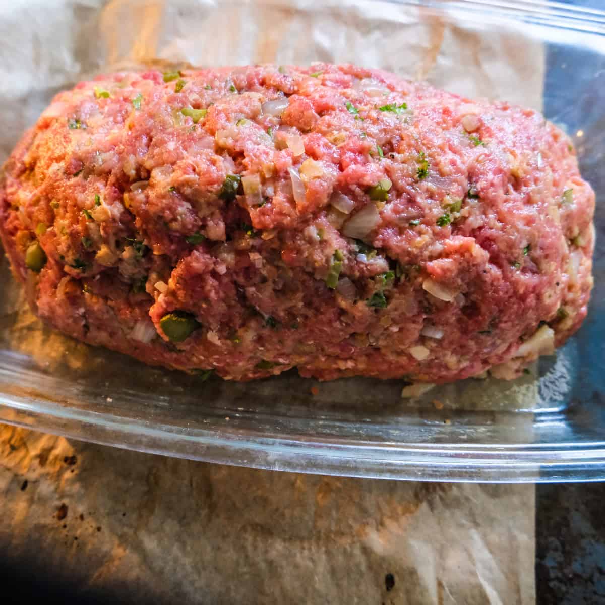 shaping the meatloaf into an oval shape