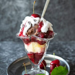 Black Forest Eis Cream dessert with cherry sauce, ice cream and whipped cream