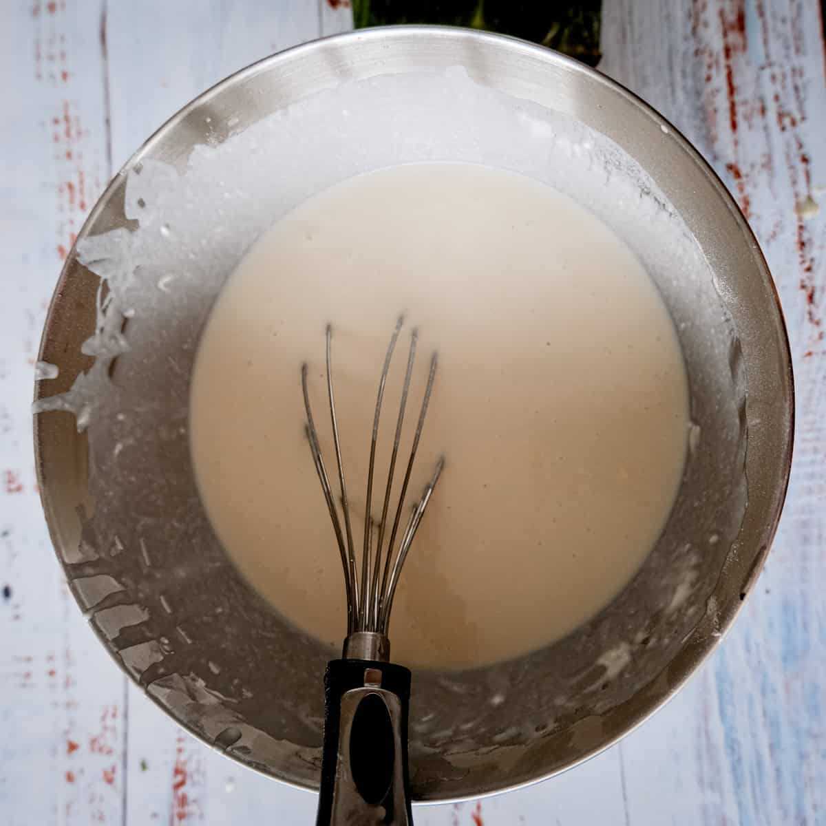 bibinka ingredients mixed together into a batter