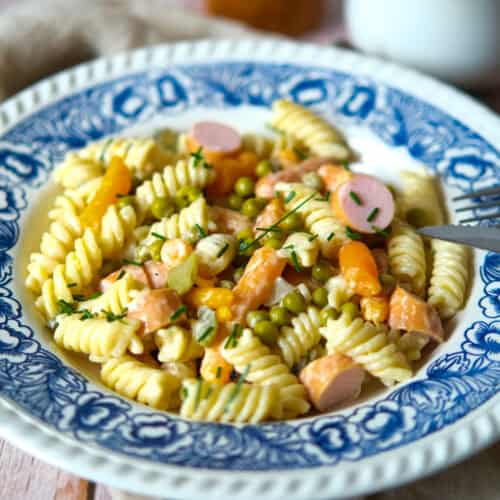 German pasta salads, with mayo, pickles and frankfurters