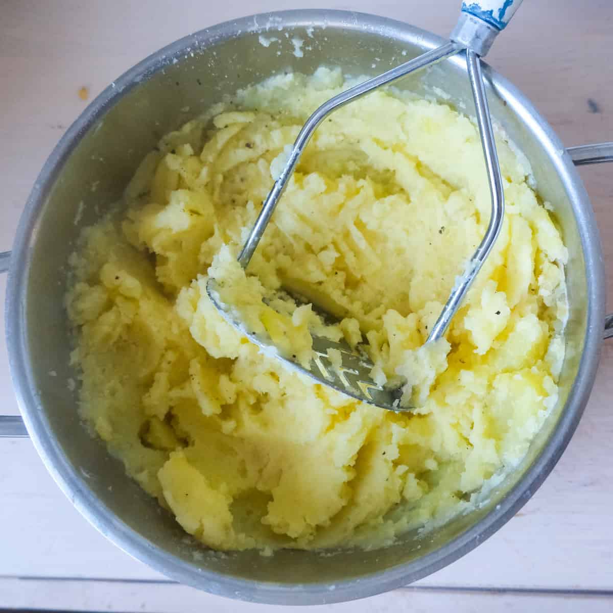 mashed potatoes with masher