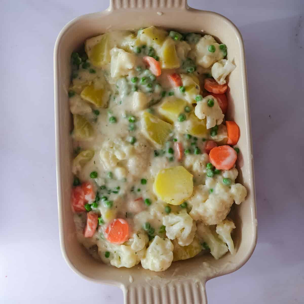 assembling the vegetable bake