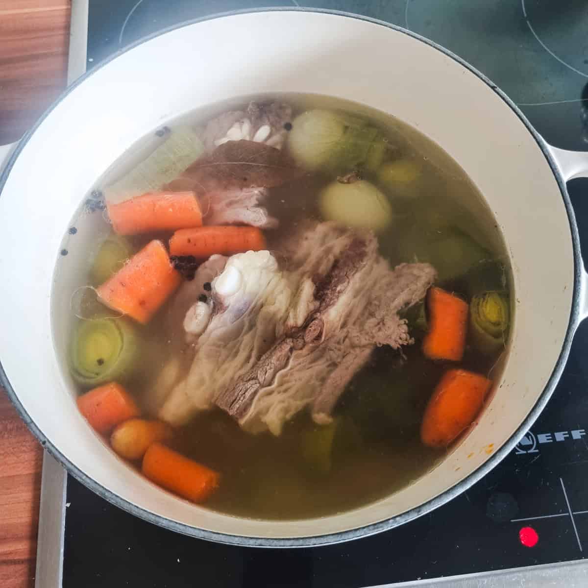 stewing the beef and vegetables.