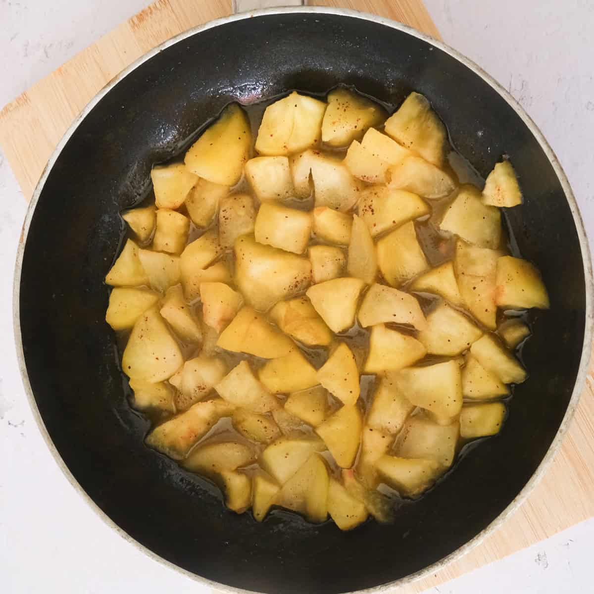 steamed apples in a saucepan.