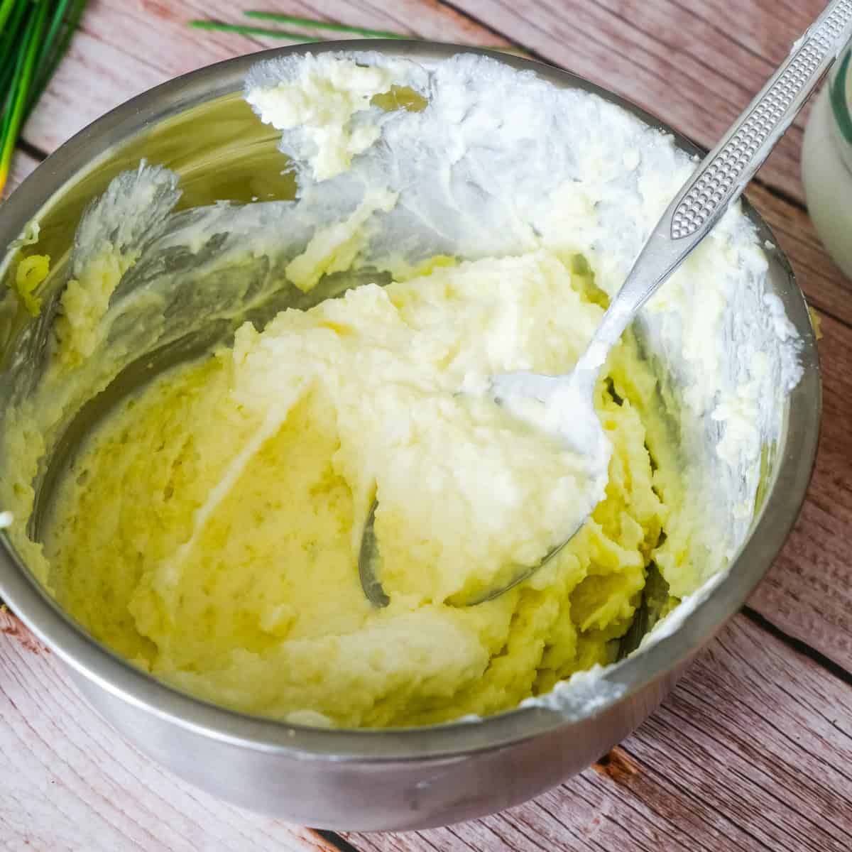 mixing potato and creame cheese and sour cream